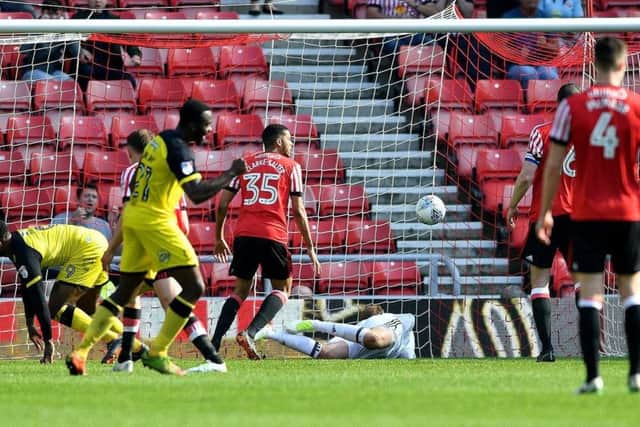 Darren Bent scores for Burton Albion in the 2-1 defeat that saw Sunderland relegated from the Championship