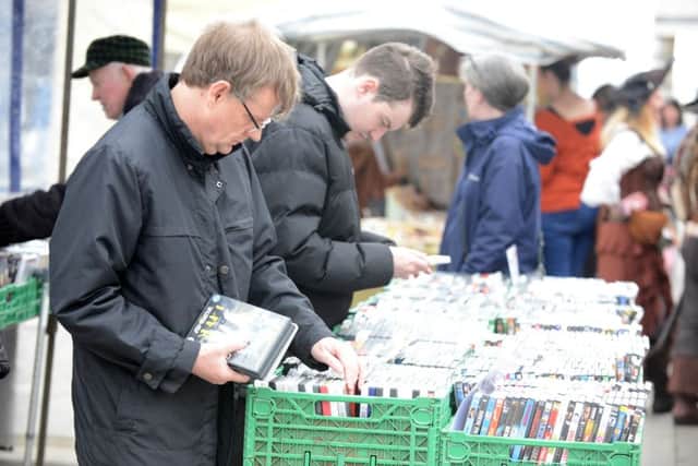 A DVD stall is one of the sales to remain part of the weekly event.