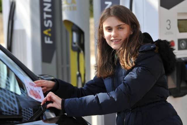 Charlotte Smith travelled from near Birmingham to Sunderland to handout Thank You cards to owners of Electric Vehicles.