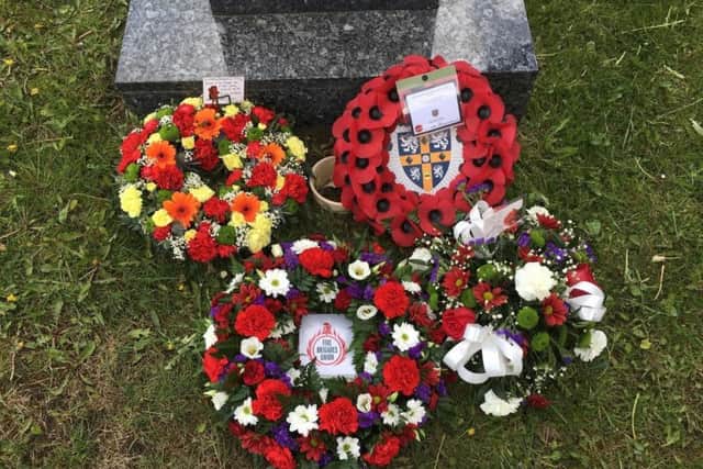 Floral tributes to fallen heroes.
