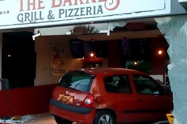 The car which smashed into The Barnes Grill and Pizzeria on Sunday evening.