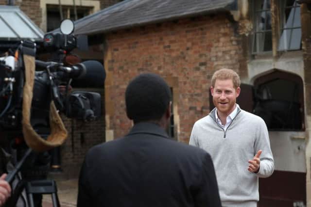 Prince Harry speaks to the media in Windsor. Picture: PA.