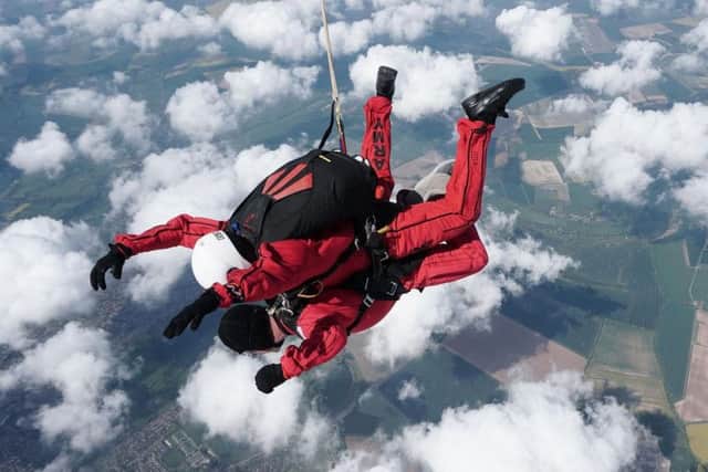 Chief constable Mike Barton during his charity skydive.