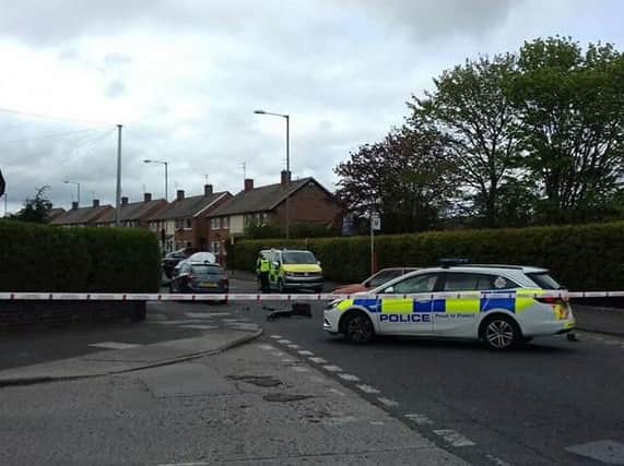 Police at the scene of the collision. Picture: Paul Hodgson