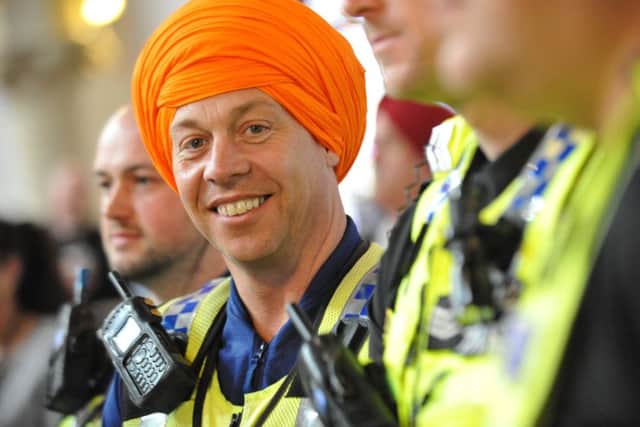 PCSO Michael Lister sports a turban during the Sikh festival Vaisakhi, at Sunderland's Sikh Community Centre last year