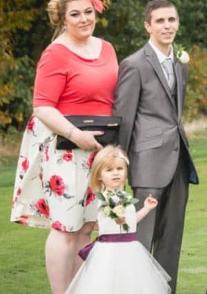 Abbie Brass pictured in October 2016 with fiance Craig Philipson and their daughter Annalise.