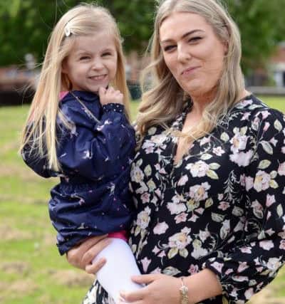 Abbie Brass, pictured with daughter Annalise, three, now takes her swimming and walks as she enjoys her healthier lifestyle.
