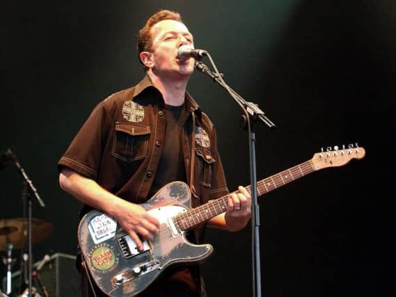 The Clash singer Joe Strummer pictured during his solo career.
