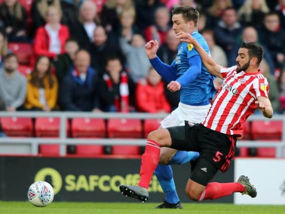 Sunderland defender Alim Ozturk will be available to face Portsmouth on Thursday night.