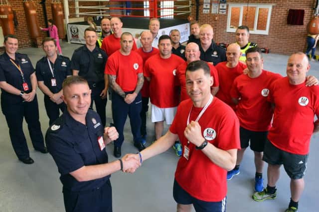 Launch of The Sunderland Community Hub, for boxing training and social skills to reduce anti-social behaviour. Front from left Tyne and Wear Fire and Rescue Service head of prevention and education Grant Brotherton and hub chairman Joe Haustead.
