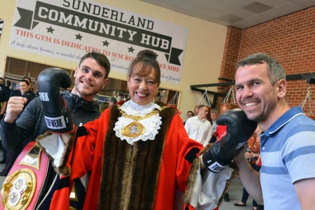 Professional boxers Thomas (left) and Martin Ward with Councillor Lynda Scanlan at the opening of the new boxing hub.