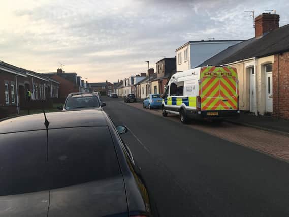Police in Edward Burdis Street, Southwick, following an incident at the weekend which has left a man fighting for his life.