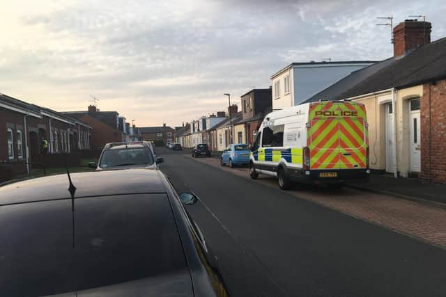 Police in Edward Burdis Street, Southwick, following an incident at the weekend which has left a man fighting for his life.