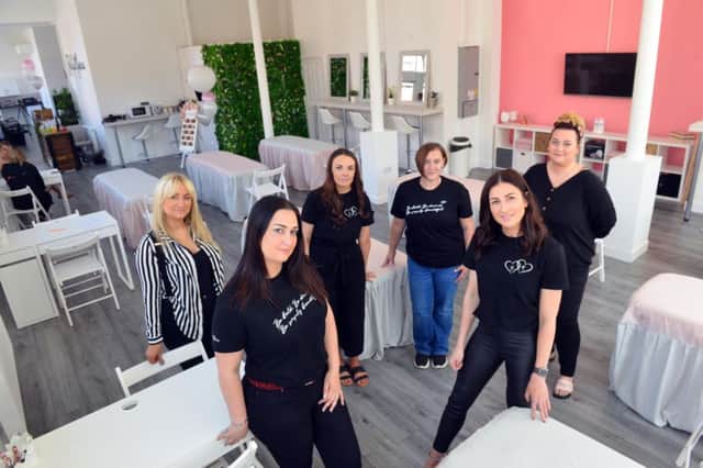 Owners Gemma Lowery and Amy McKenna (R) of Bella Marie Training Academy open another academy on Borough Road, Sunderland. Back from left tutors 
Natalie Evans, Ashleigh Edwards, Viki O'Neill and Kaye Kennedy.