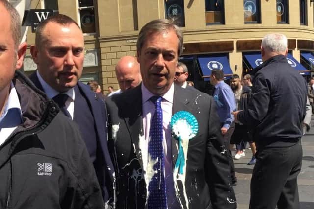 Brexit Party leader Nigel Farage after he was doused in milkshake during a campaign walkabout in Newcastle. Pic: Tom Wilkinson/PA Wire.