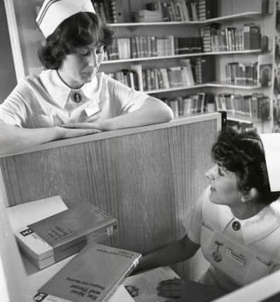 Student nurses Margaret Linney and Sally Dyson in the new library.