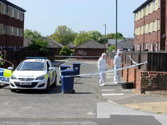 Police investigating the the scene following the death of Simon Bowman in High Street, Jarrow.