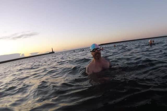 Chris Nicholas sea swimming with the Fausto Bathing Club.