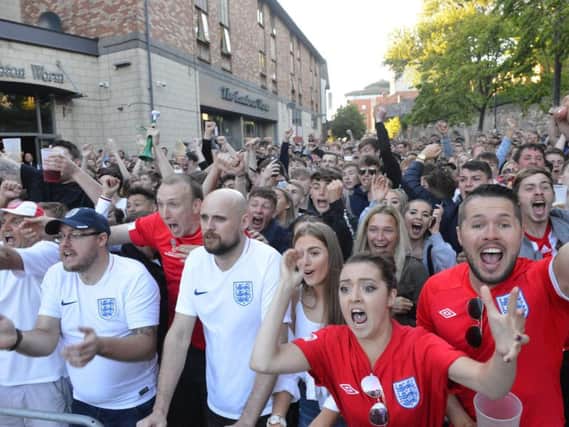 Fans watch England take on Colombia at the FanZone in Low Row during last year's World Cup