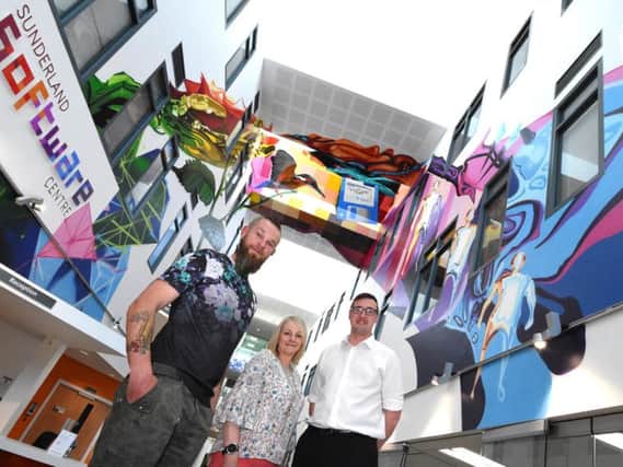Artist Frank Styles, Sunderland Software Centre Manager Berni Whitaker and Coun Michael Mordey