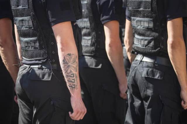 Visible tattoos should be covered while an officer is on duty in Northumbria