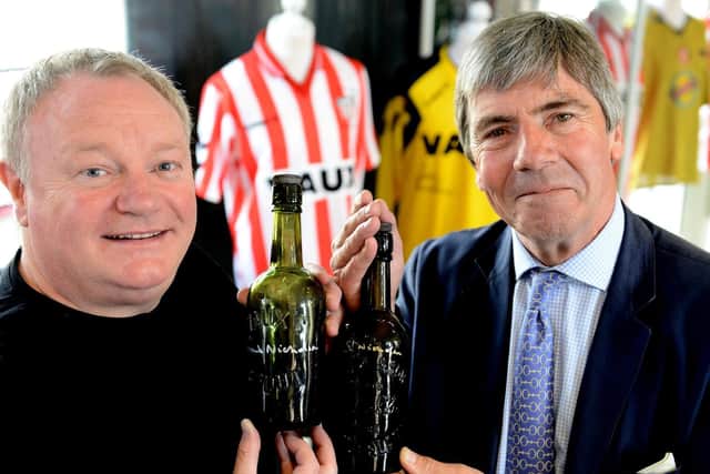 Michael Ganley (left) and Frank Nicholson with the first two signed original Vaux bottles