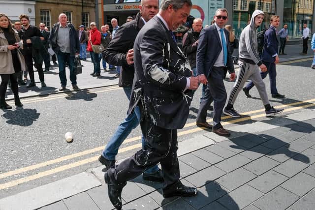 Brexit Party leader Nigel Farage had a milkshake thrown over him as he visited Northumberland Street in Newcastle Upon Tyne (Photo by Ian Forsyth/Getty Images)