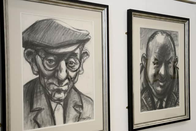A selection of portraits hanging in the Norman Cornish - The Portraits exhibition on show at The Gala Gallery in Durham.