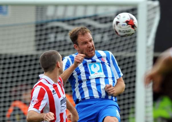 Sam Collins in action against Cheltenham Town. Picture by FRANK REID