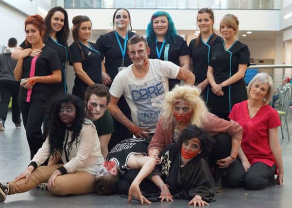 THRILLING TIME ... East Durham College students are all set for their Halloween Zombie Run.