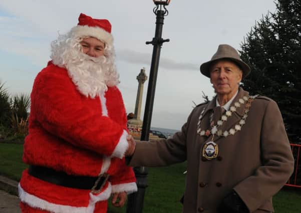 JUST PASSING BY: Seaham Mayor, Coun Bruce Burn, meets up with Santa ahead of the switch-on of the Christmas Lights.