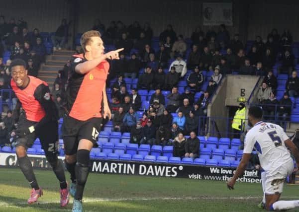 MAKING HIS POINT:. Scott Fenwick celebrates his equaliser for Hartlepool United at Tranmere Rovers