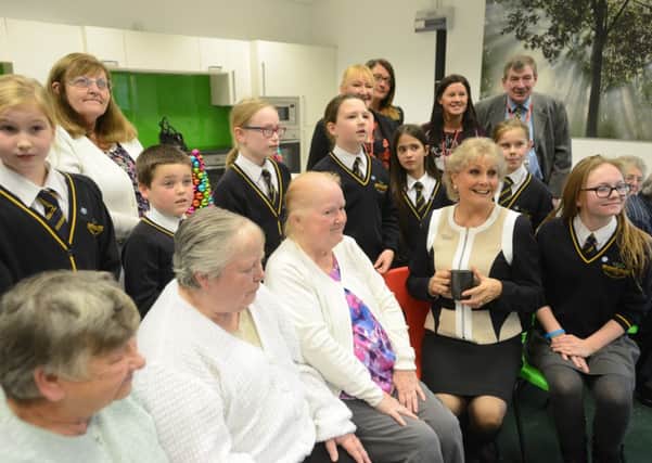 CELEBRITY PRAISE: Angela Rippon talking to residents and pupils at Bernard Gilpin School.