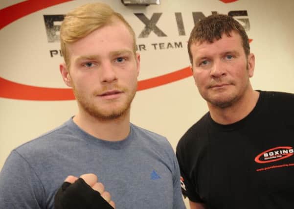 NEW PRO: Professional boxer Liam Cammock with coach Peter Cope.