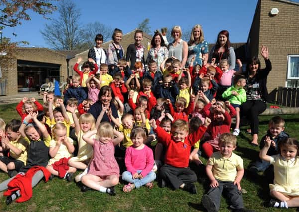 THREE CHEERS: Oxclose Nursery Community School celebrates an outstanding Ofsted report.
