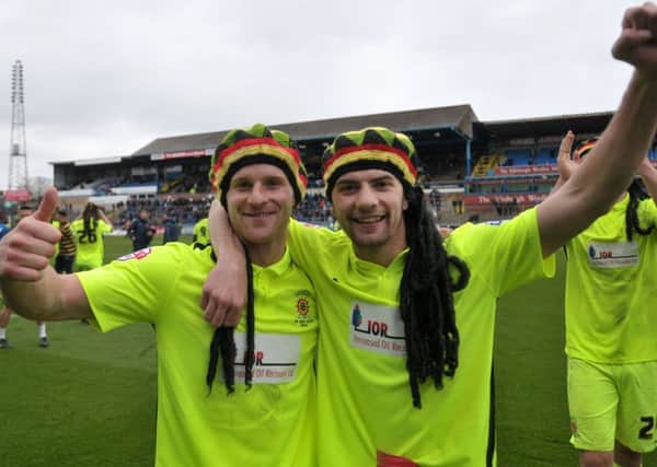 BE HAPPY: Jonathan Franks and Jordan Jones at the end of the game against Carlisle United. Picture by FRANK REID