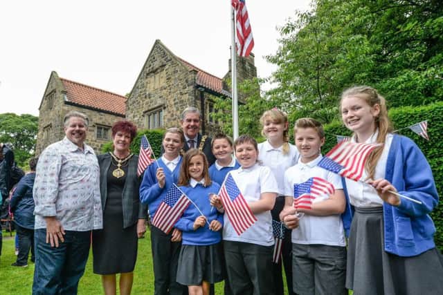 The Star Spangled Banner is raised over Washington Old Hall, the ancestral home of America's first president, as the annual 4th of July celebrations got underway this morning, organised in partnership by the National Trust, Friends of Washington Old Hall and Sunderland City Council.
Picture shows students from George Washington Primary School with Mayor and Mayoress Barry and Carol Curran and Jon Gann from Washington DC