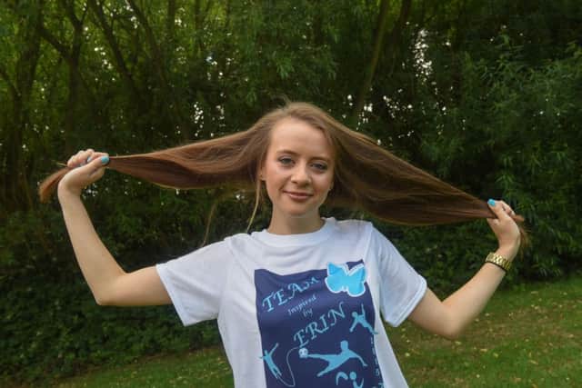 Holley Park Academy pupil Charley before she had her hair cut in memory of Erin Bates.