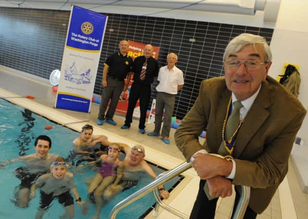 Washington Rotary Club president Dave Neville, is joined by swimmers at Washington Leisure Centre, and secretary Bill Hopps, centre assistant manager Dave Hazard and past president Bob Twist to launch their swimathon.