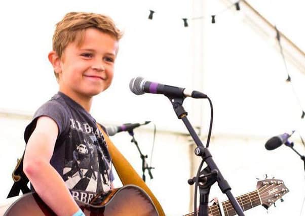 Tom Smith, 11, has performed with some of the countrys top musicians.