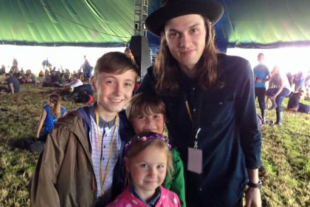 Tom Smith and his siblings with James Bay at Glastonbury.