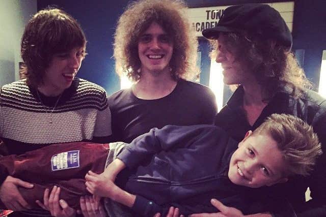 Tom with catfish and the Bottlemen, who he supported at the O2 Academy in Newcastle.