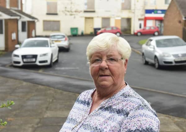 Freda Devine who is sick of the rat problem near her home.