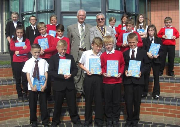 Some of the pupils with Ray Millmoor and Joe Sherrington from the Rotary Club.