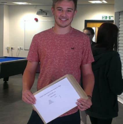 Kane Iceton with his results.