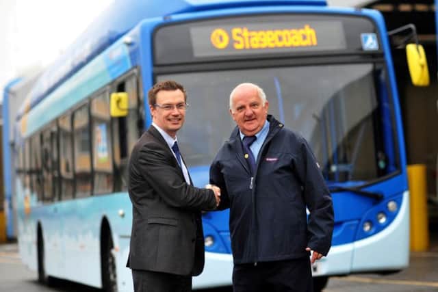 From left, Stagecoach North East operations director Matthew Cranwell with driver Bob Miller