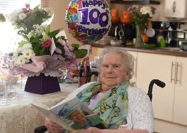 Bella Boardman, of the Field View Care Home, Heseldon Road, Blackhall, with her card from The Queen.