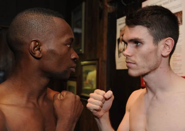 Nasibu Ramadhani and Tommy Ward face up to each other at the weigh-in