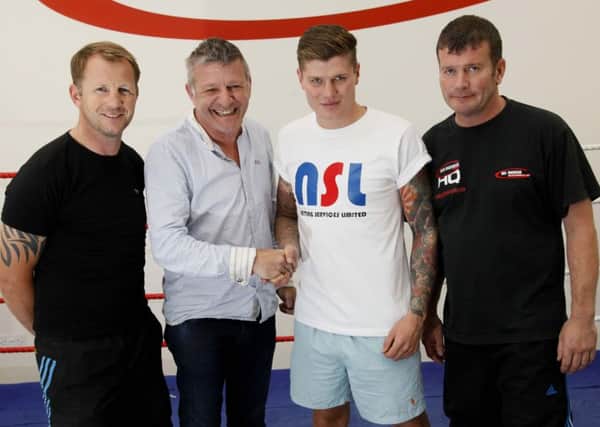 BIG NIGHT: Boxer Peter Cope Jnr with his sponsor Kevin Lloyd and coaches Alan Temple (left) and Peter Cope (right)  Picture: DAVID WOOD