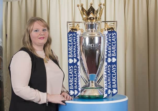 Karen Quigley with the Premier League trophy.